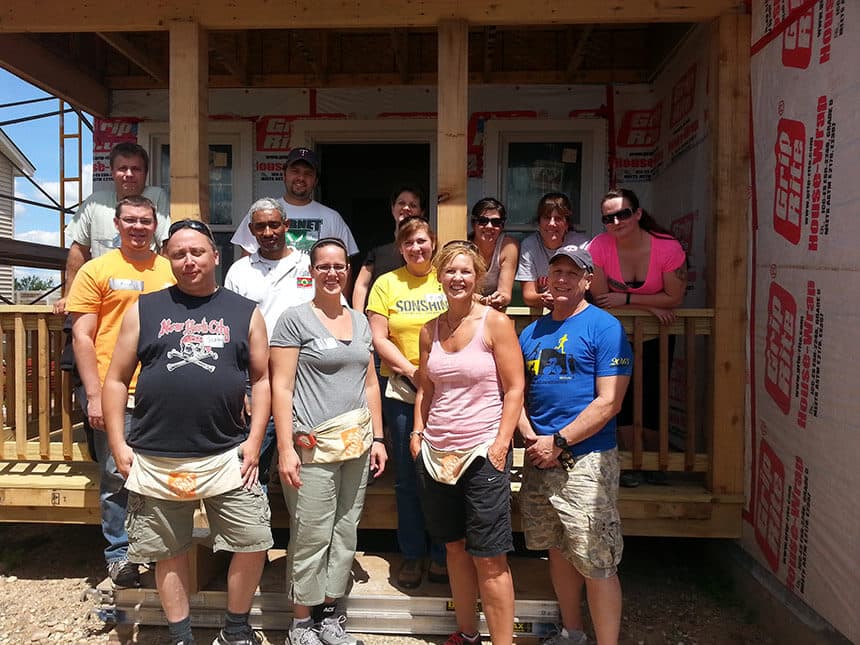 Milestone employees volunteer at Habitat For Humanity